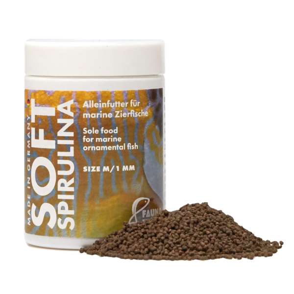 Soft Spirulina fish food for marine ornamental fish in a white jar with pellets, labeled in German and English.